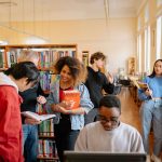 university students together in library