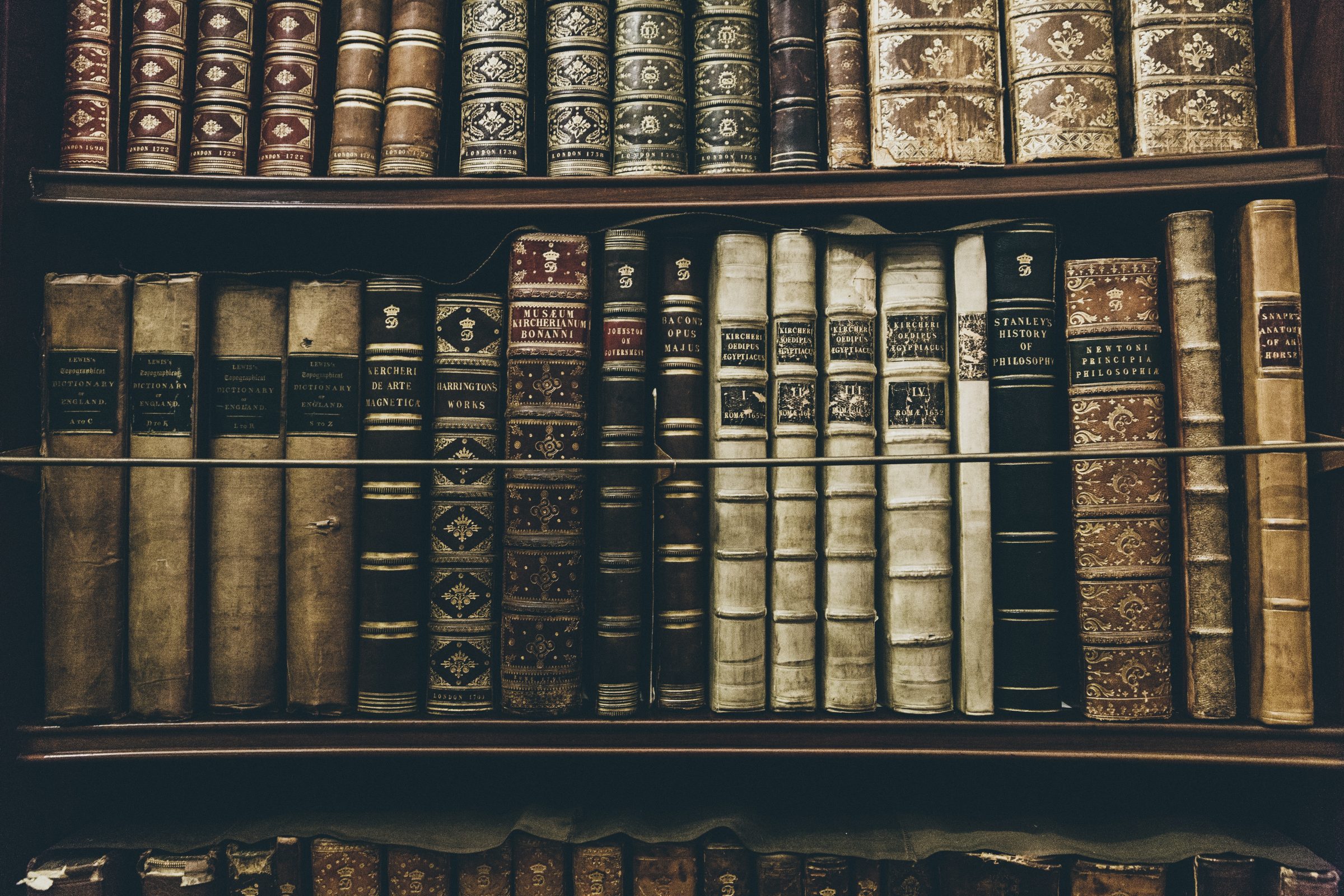 image of rare hardback books on a library shelf